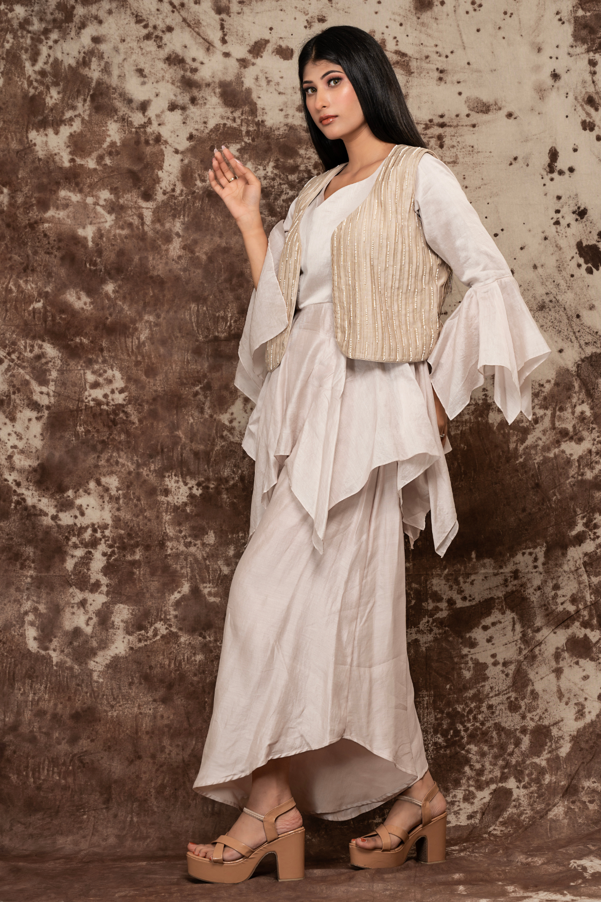 Peplum top with waterfall pants and embroidered jacket