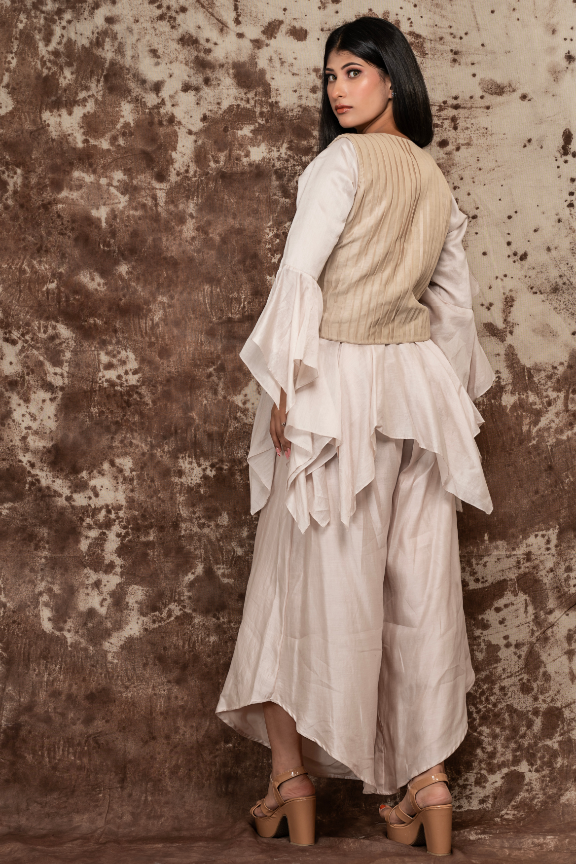 Peplum top with waterfall pants and embroidered jacket